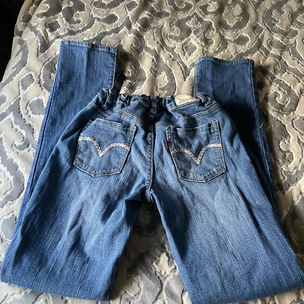 Good used condition Levi skinny jeans. Rubber waist and inside elastic